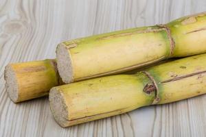 Sugar reed on wood photo