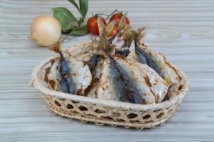 Dry fish on wood photo