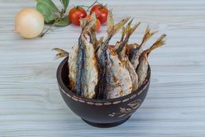 Dry fish on wood photo