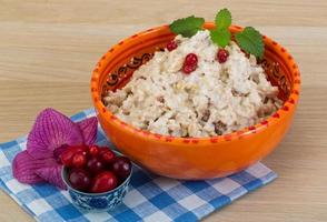 Oatmeal on wood photo