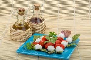 Caprese salad on plate photo