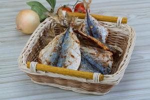 Dry fish on wood photo