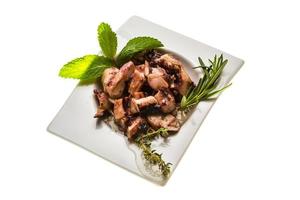 Grilled octopus on white photo