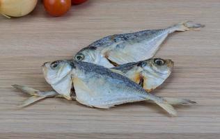 Dry fish on wood photo