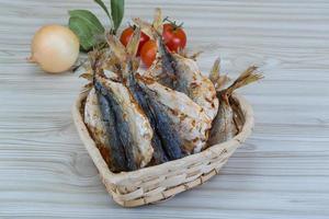 Dry fish on wood photo