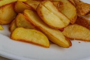 plato de patatas fritas foto