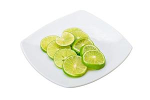 Sliced lime on white photo