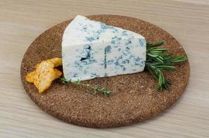 Blue cheese on wood photo