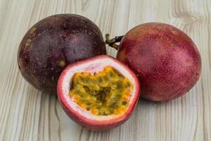 Passion fruit on wood photo