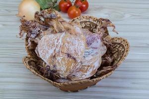 Dried squid on wood photo