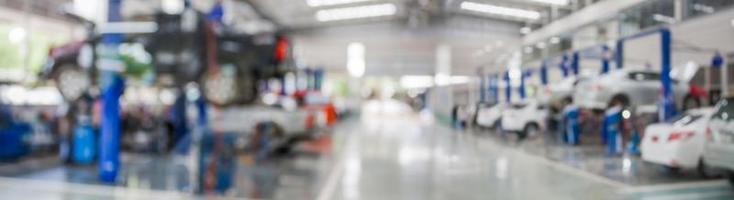 car service centre auto repair workshop blurred panoramic background photo