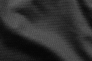 Black sport cloth fabric football shirt jersey texture close up photo