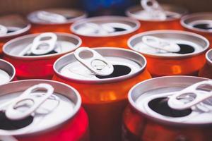 Empty aluminium drink cans recycling background concept photo