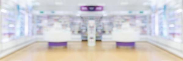 Pharmacy drugstore shelves interior blur medical background photo