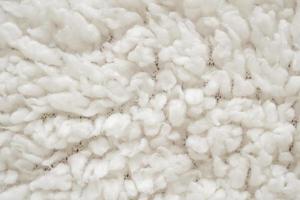 White fluffy fur fabric wool texture background photo