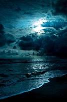 ranquil night over the sea with moonlight photo