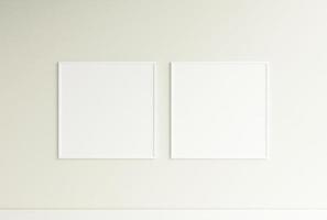 Clean and minimalist front view square white photo or poster frame mockup hanging on the wall. 3d rendering.