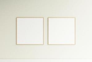 Clean and minimalist front view square wooden photo or poster frame mockup hanging on the wall. 3d rendering.