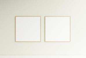 Clean and minimalist front view square wooden photo or poster frame mockup hanging on the wall. 3d rendering.