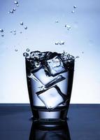 The image of pouring drinking water, into a glass, photo