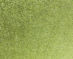 Artificial green lawn backyard for background. Texture for design photo