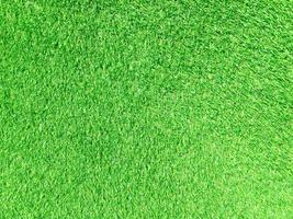 Artificial green lawn backyard for background. Texture for design photo