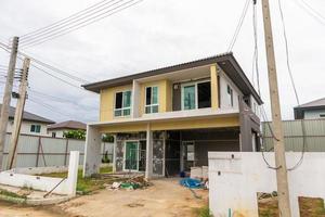 construction residential new house in progress at building site photo