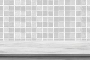 Empty white marble table top with blur tile wall bathroom background photo