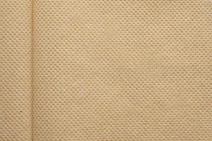 Abstract brown recycled tissue paper napkin texture background photo