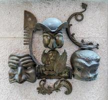 Venice, Italy, 2014. Venetian emblem fixed to a wall in Venice photo