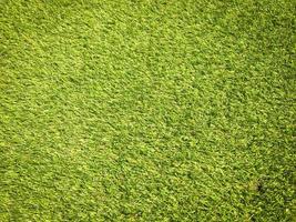 Artificial grass texture space background photo