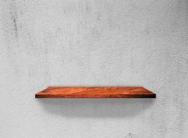 Wood shelves on concrete wall texture background with clipping path. Top view photo