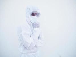 Portrait of confident asian male doctor or scientist in PPE suite uniform empty space deep thinking creative person hand on chin with looking ahead on white background. COVID-19 concept. photo