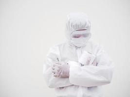 Asian male doctor or scientist in PPE suite uniform holding toilet paper. Lack of toilet paper in the quarantine of coronavirus. COVID-19 concept isolated white background photo