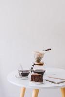 Breakfast with chocolate cake and coffee served on a beautiful living home photo