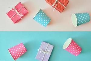 Stylish and beautiful gift box on pastel background. photo