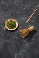 Organic Green Matcha Tea on wooden table, copyspace photo