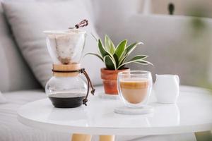 Breakfast with chocolate cake and coffee served on a beautiful living home photo