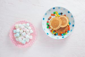 Creative breakfast for children on white background, top view photo