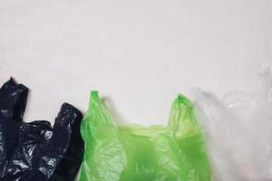 Plastic bags on white background photo