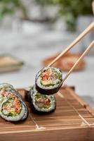Korean roll Gimbap kimbob made from steamed white rice bap and various other ingredients photo