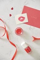 Happy Valentine's Day concept on vintage paper sheet with lipstick photo
