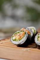 Korean roll Gimbap made from steamed white rice and various other ingredients photo