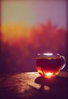 Representación 3d de una taza de té caliente en luces de otoño foto