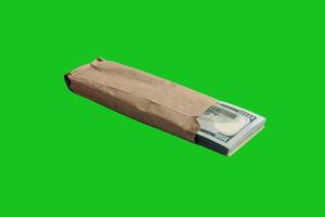 Bundle of US dollar bills isolated on chroma keyer green. Pack of american money with high resolution on perfect green mask photo