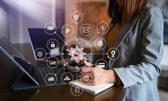 Digital marketing media website ad,social network, SEO, smartphone app in virtual screen.business hand working on laptop with digital layer business strategy . photo