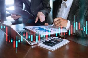 Two stock traiders making analysis of digital market and investment in block chain crypto currency. Stock trade concept photo