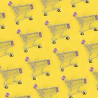 Shopping addiction, shopping lover or shopaholic concept. Many small empty shopping carts perform a pattern on a pastel colored paper background. Flat lay composition, top view photo