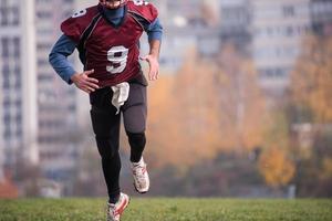 american football player in action photo