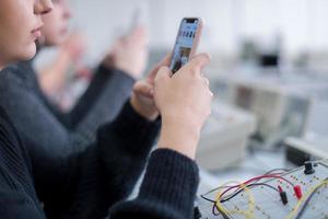 female student using a mobile phone photo